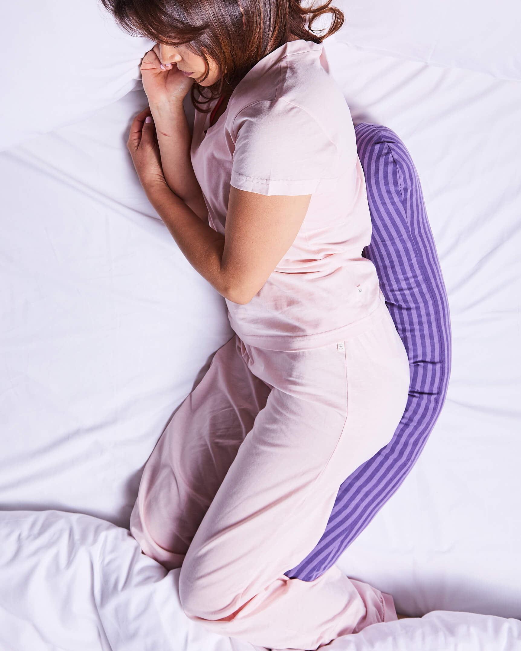 Adult women sleeping with the weighted body sleeper