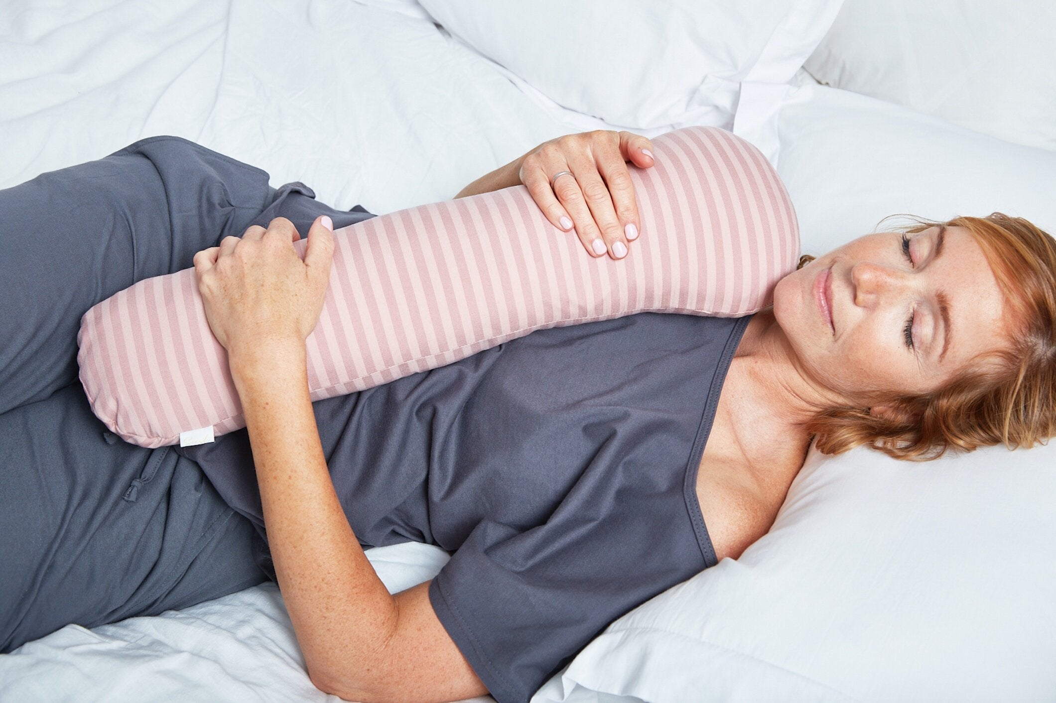 Adult women sleeping hugging weighted short sleeper